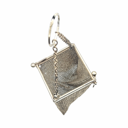 Early 20th-century chainmail mesh purse with kiss-lock frame and finger ring handle
