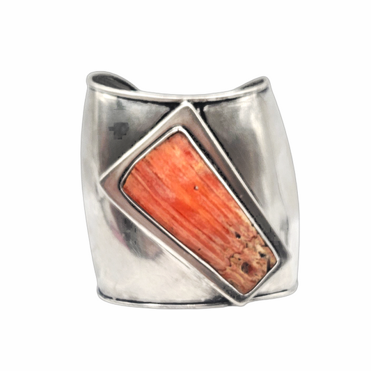 Vintage modernist silver cuff bracelet with orange spiny oyster shell inlay