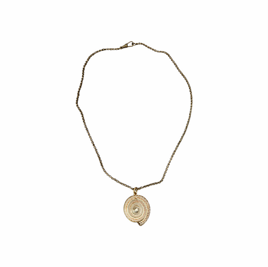 Vintage Shiva eye shell spiral pendant necklace on an antiqued gold-tone chain. Natural sea-shell talisman jewellery with a delicate bohemian look.