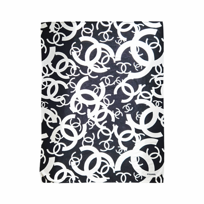 CHANEL black and white cotton terry beach towel with oversized interlocking CC monogram pattern