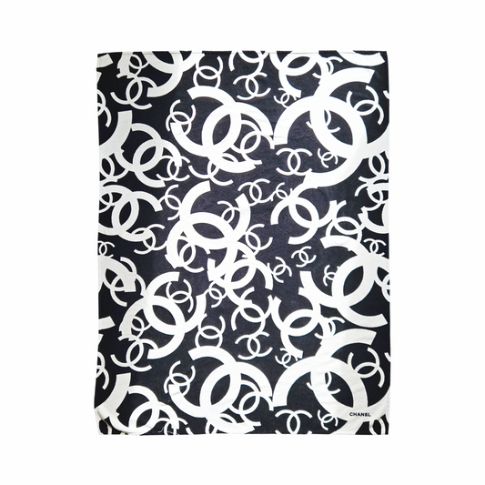 CHANEL black and white cotton terry beach towel with oversized interlocking CC monogram pattern
