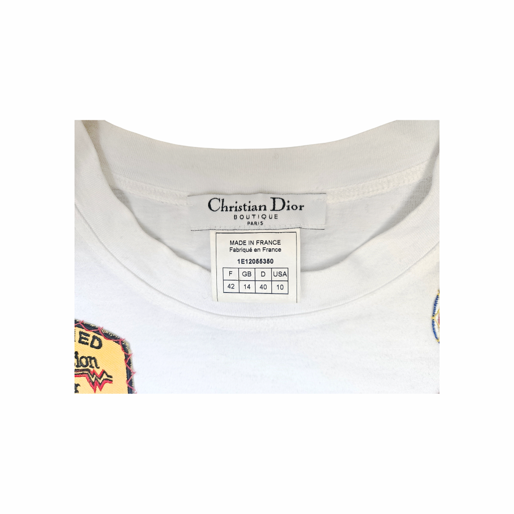 Shop this rare Christian Dior by John Galliano 2001 Miss Diorella white cotton T-shirt with embroidered Dior Speedway and racing-style patches. Made in France.