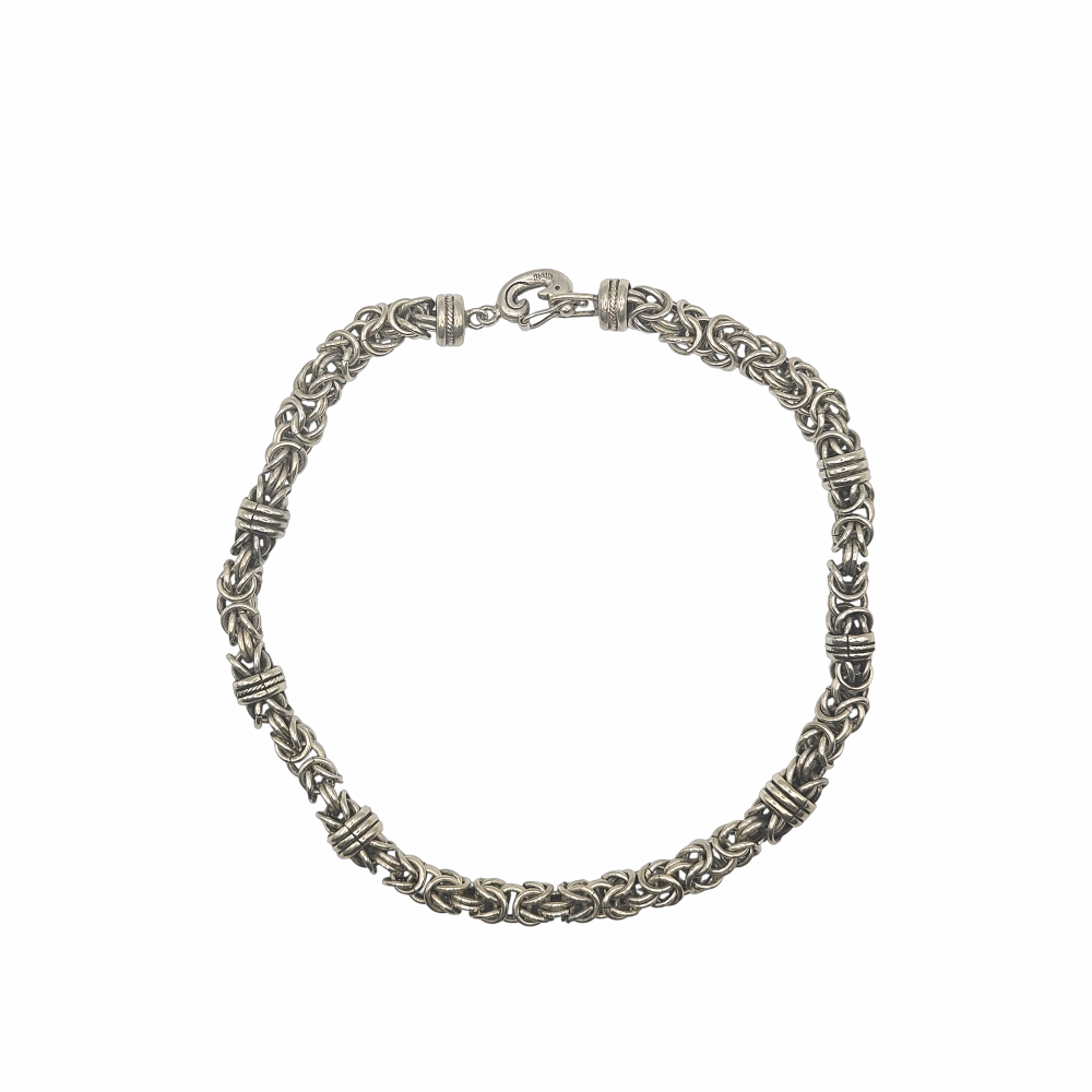 Vintage 950 silver statement necklace with dense Byzantine-style woven links, decorative wrapped spacer collars and sculptural hook clasp. Substantial artisan silver jewellery.