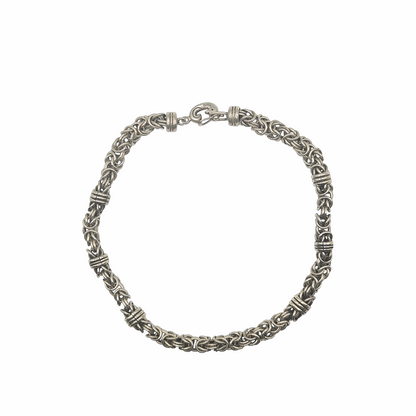 Vintage 950 silver statement necklace with dense Byzantine-style woven links, decorative wrapped spacer collars and sculptural hook clasp. Substantial artisan silver jewellery.