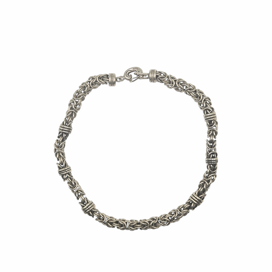 Vintage 950 silver statement necklace with dense Byzantine-style woven links, decorative wrapped spacer collars and sculptural hook clasp. Substantial artisan silver jewellery.