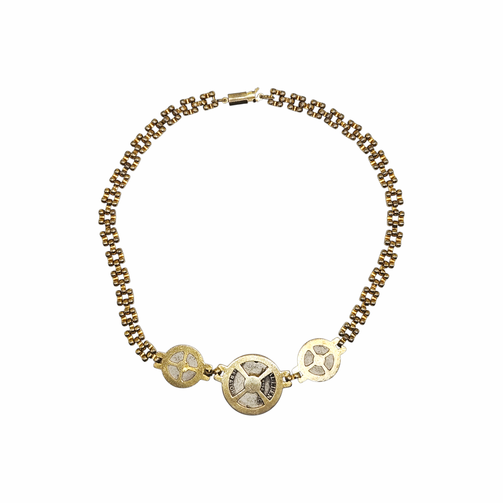 Vintage Roman Revival Gallienus three-coin necklace in gold and antiqued silver tone with articulated link chain and classical medallions.