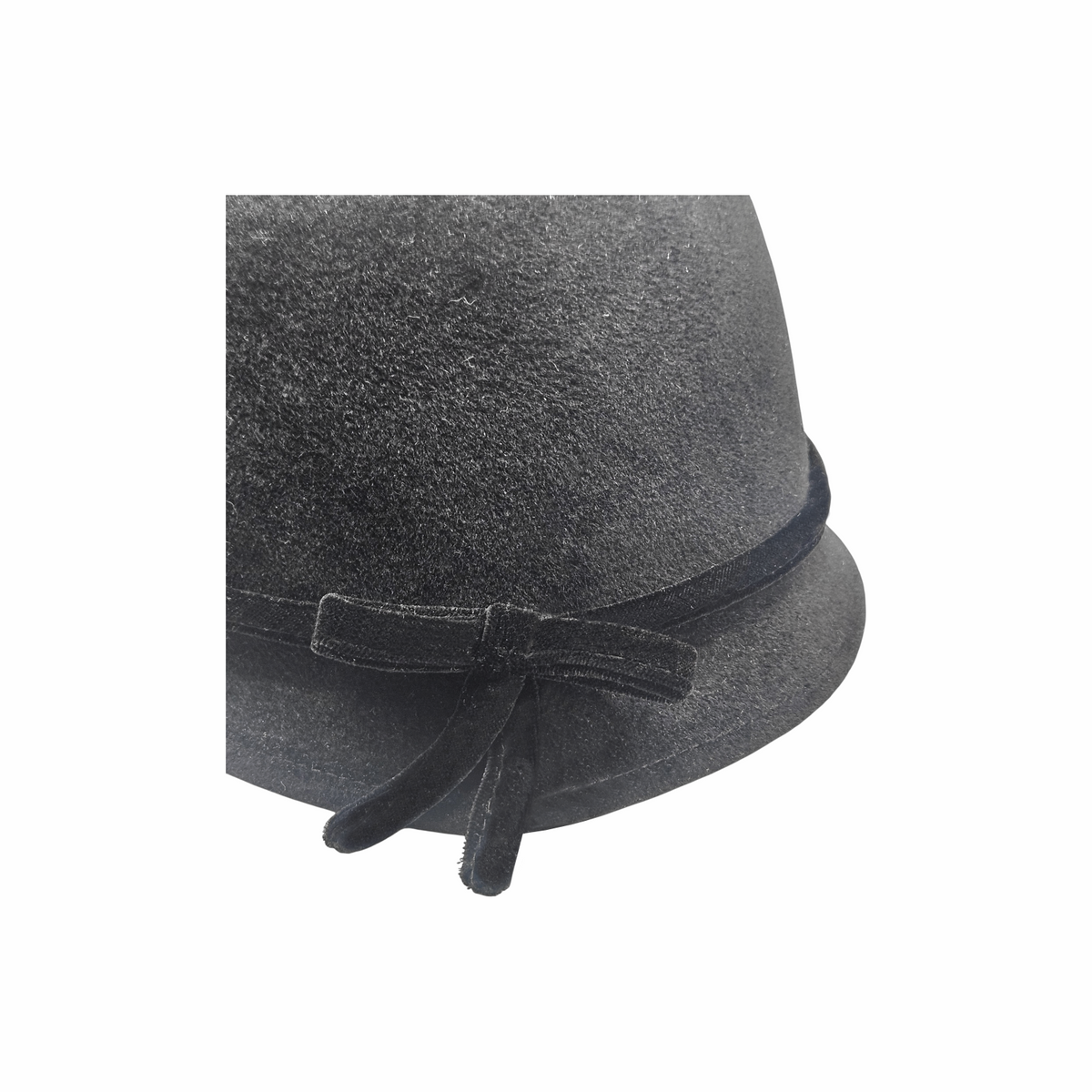 Close-up of black velvet ribbon bow on Daniele Meucci cloche hat