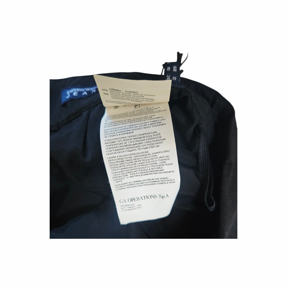 Emporio Armani Jeans label and composition tag on grey skirt