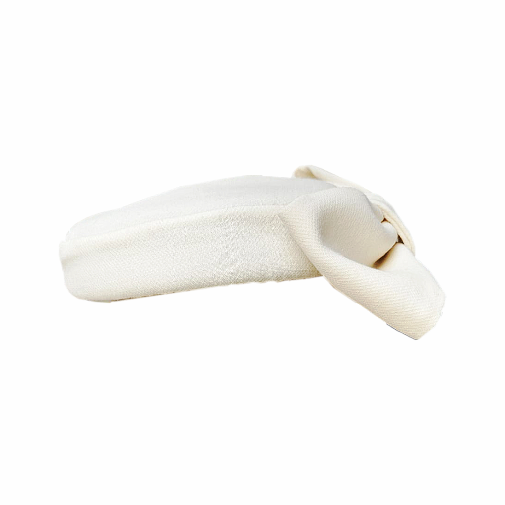 Vintage 1950s-60s ivory cocktail hat with an oversized bow and elegant mid-century silhouette. A distinctive occasion hat for weddings, races and formal events.