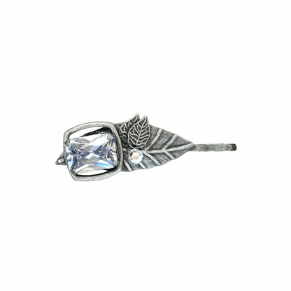 Johnny Loves Rosie silver-tone crystal leaf hair slide with antiqued botanical detailing and a long bar fastening for updos and occasion styling.