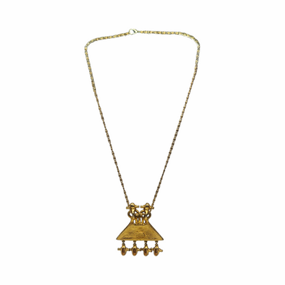 1980s Judith Leiber gold-plated figural pendant necklace with articulated drops and West African-inspired - likely inspired by senufo amulettes - sculptural detailing. Signed vintage designer jewellery.