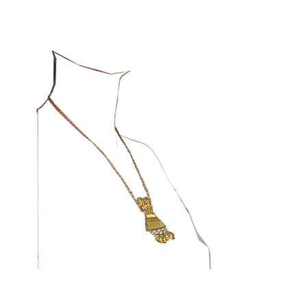 1980s Judith Leiber gold-plated figural pendant necklace with articulated drops and West African-inspired - likely inspired by senufo amulettes - sculptural detailing. Signed vintage designer jewellery.