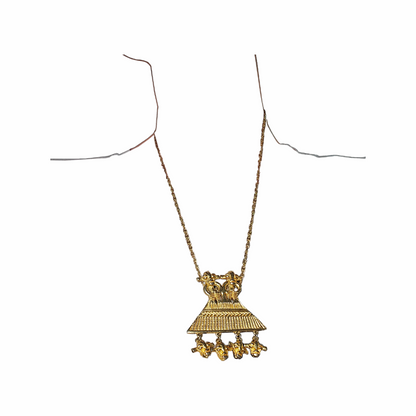 1980s Judith Leiber gold-plated figural pendant necklace with articulated drops and West African-inspired - likely inspired by senufo amulettes - sculptural detailing. Signed vintage designer jewellery.