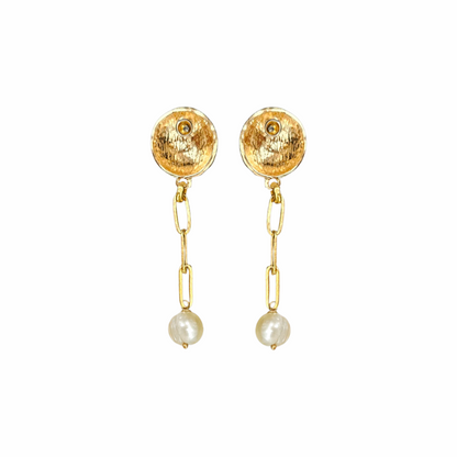 Gold-tone hammered button drop earrings with paperclip chain links and cultured freshwater pearl drops. Sculptural statement earrings with a modern organic finish.