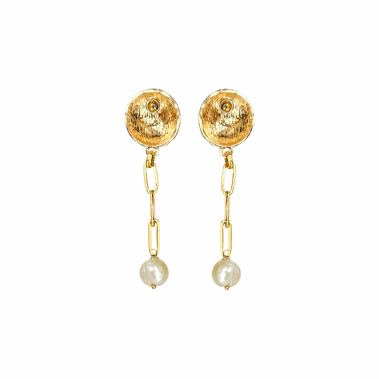 Gold-tone hammered button drop earrings with paperclip chain links and cultured freshwater pearl drops. Sculptural statement earrings with a modern organic finish.