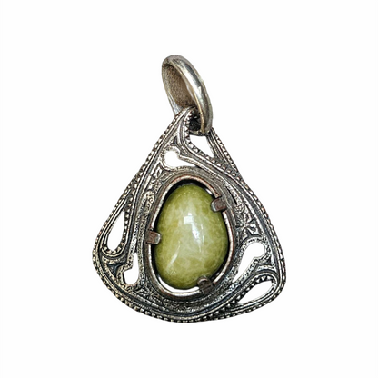 Vintage Miracle Celtic pendant with a green jade-effect glass cabochon and ornate antiqued pewter openwork setting.
