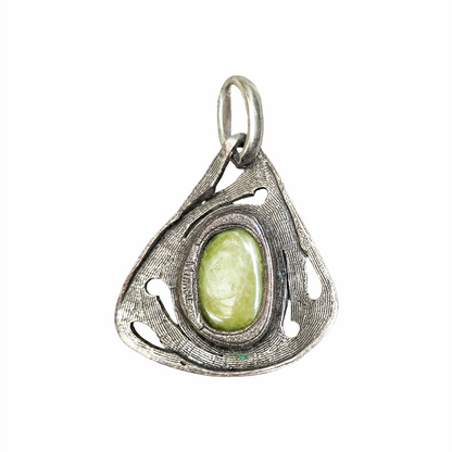 Vintage Miracle Celtic pendant with a green jade-effect glass cabochon and ornate antiqued pewter openwork setting.
