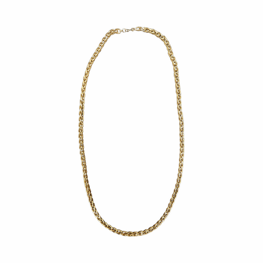 Vintage Monet gold-tone chain necklace with interwoven oval links and signed clasp. Likely 1980s–1990s. A timeless piece of vintage designer costume jewellery, ideal for layering or wearing alone.
