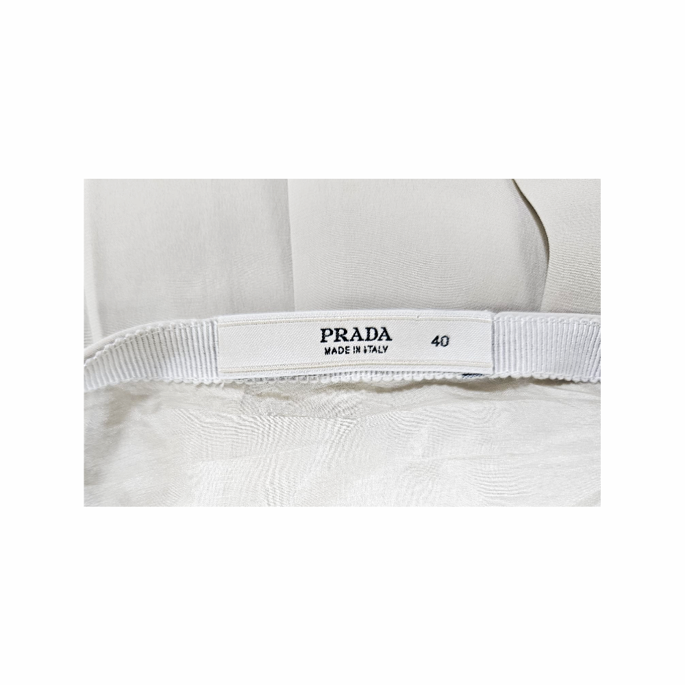 S/S 2000 Ivory Silk Pleated Midi Skirt with Yellow Ribbon Hem detail - Prada - Re:Velvet