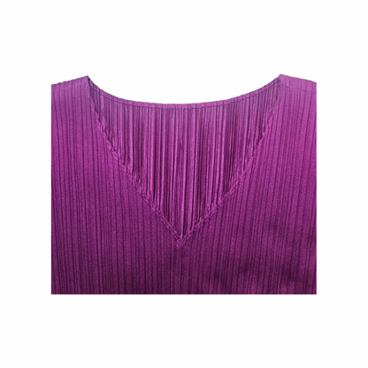 V-neck detail on plum purple Pleats Please Issey Miyake pleated dress