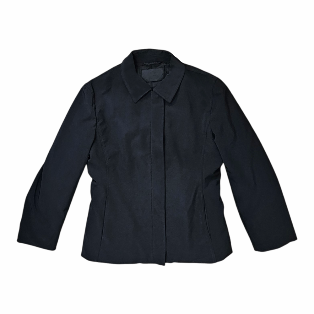 Prada Milano black fitted tailored jacket, Made in Italy, size 42, with sculpted seam detailing, full lining , Prada branded zips and pockets.