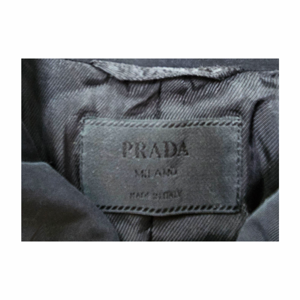 Prada Milano black fitted tailored jacket, Made in Italy, size 42, with sculpted seam detailing, full lining, Prada branded zips and pockets.