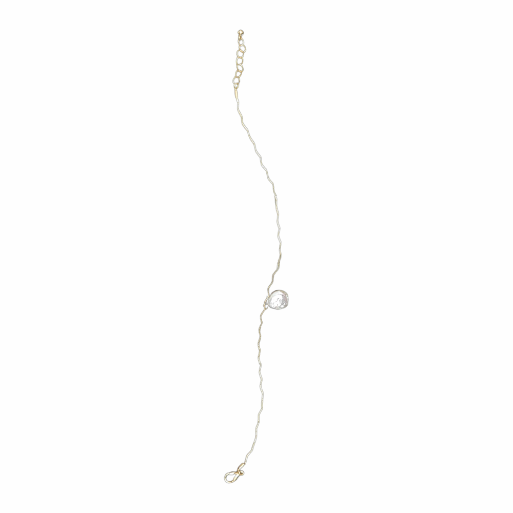 Gold-tone short necklace with an irregular mother-of-pearl disc pendant, textured chain and adjustable lobster-clasp fastening.