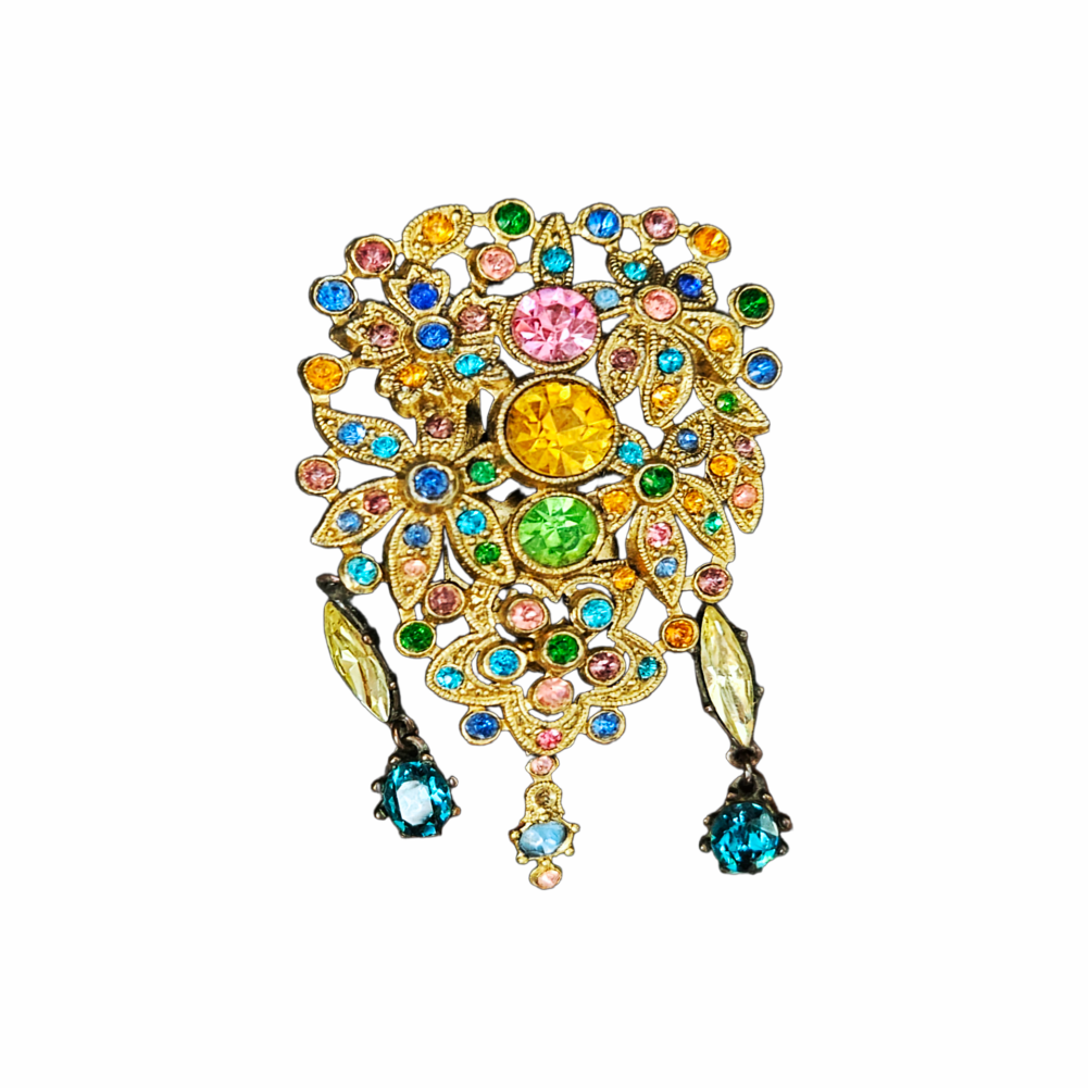 Vintage multicolour rhinestone floral dress clip with gold-tone openwork leaves and articulated blue glass drops, dating from approximately the 1930s–1940s.