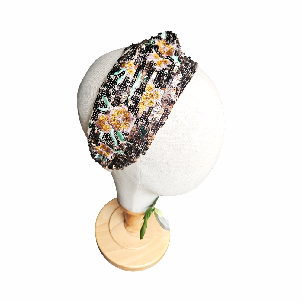Floral embroidered and sequin turban headband with twisted front and elasticated back, ideal for evening, party and festival styling.