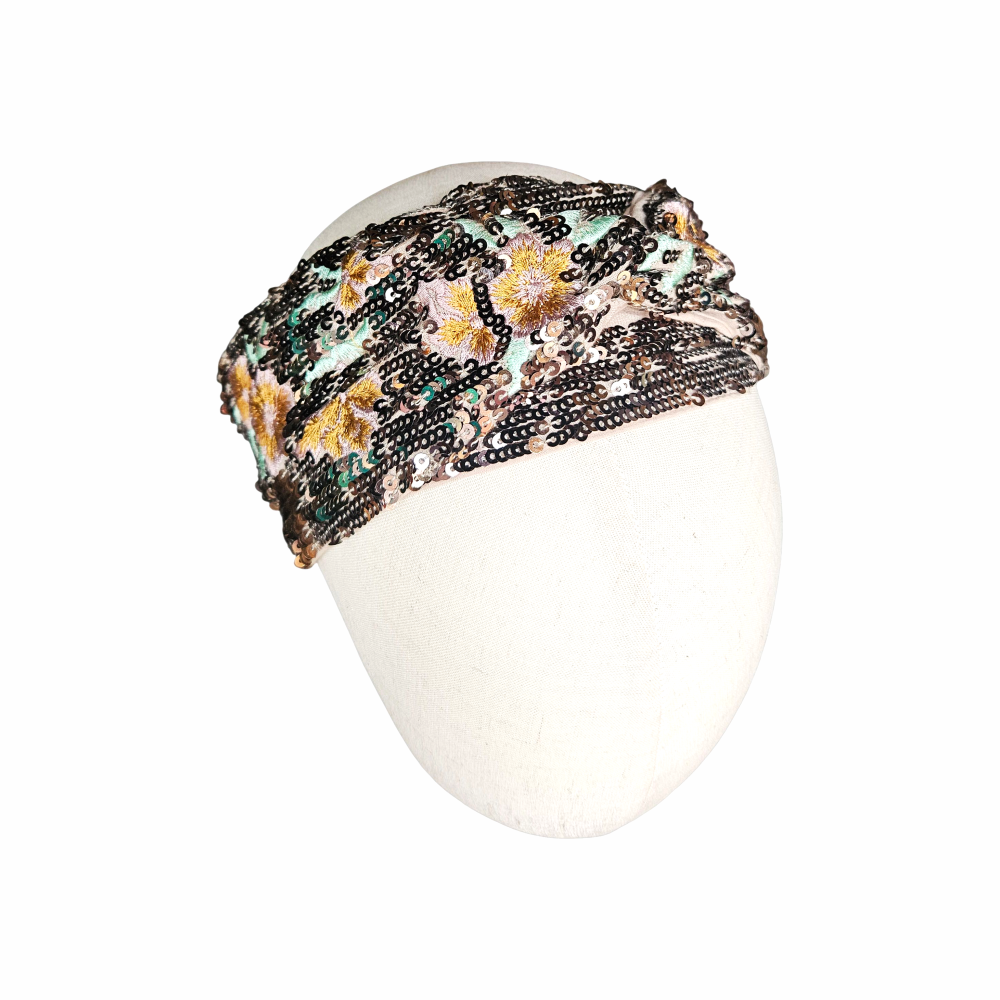 Floral embroidered and sequin turban headband with twisted front and elasticated back, ideal for evening, party and festival styling.