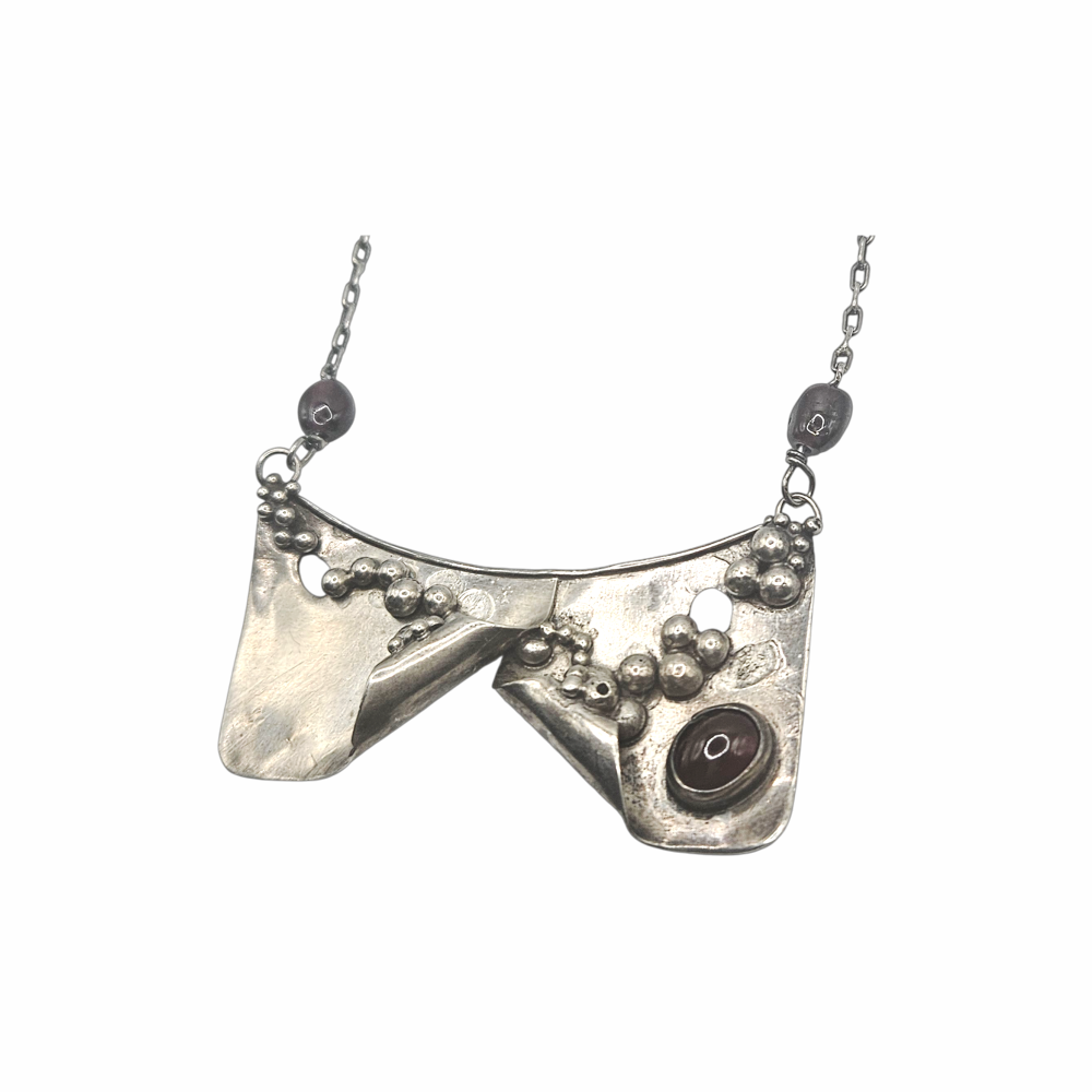 Brutalist artisan sterling silver pendant with red glass cabochon, granulated silver and geometric forms