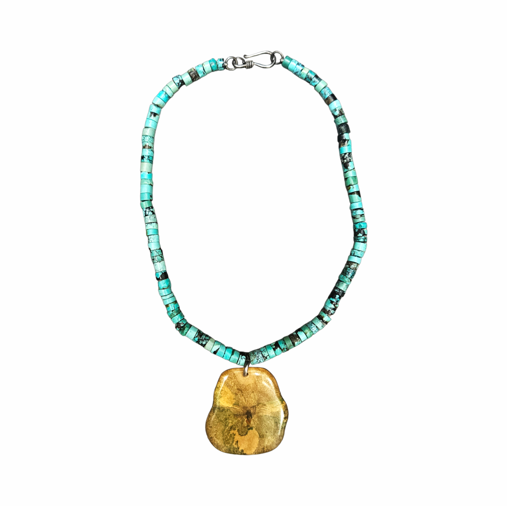Vintage turquoise heishi bead necklace with botanical resin pendant, matrix-patterned stone beads and silver-tone hook clasp. Bohemian artisan jewellery.