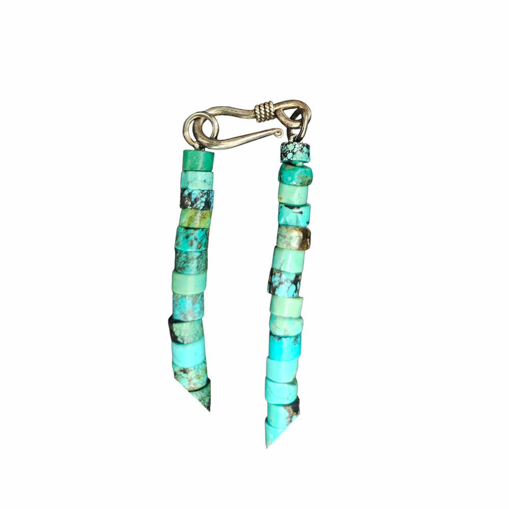 Vintage turquoise heishi bead necklace with botanical resin pendant, matrix-patterned stone beads and silver-tone hook clasp. Bohemian artisan jewellery.