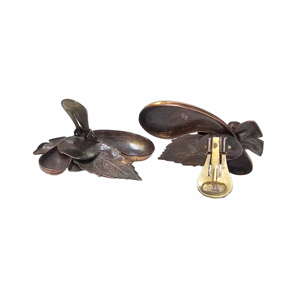Oversized vintage clip earrings with clear rhinestones and leaf detail