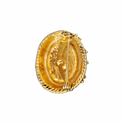 Vintage green hardstone chip mosaic oval brooch in ornate antiqued gold-tone metal, circa 1960s–1970s.
