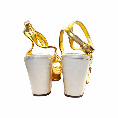 Vintage Prada cream and gold platform heels