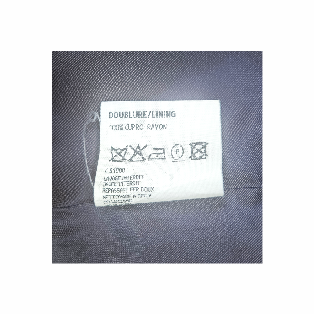 Vintage Yves Saint Laurent skirt lining label showing 100% cupro rayon