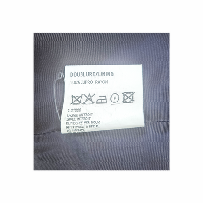 Vintage Yves Saint Laurent skirt lining label showing 100% cupro rayon